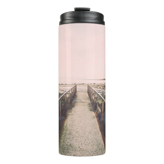 Old bridge with rusty metal rails near sea port. V Thermosbeker (Voorkant)