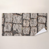 Old cobble stone pattern at the streetabstract, an badhanddoek (Badhanddoek)