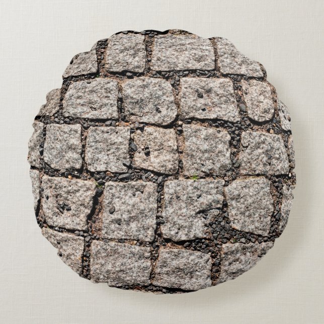 Old cobble stone pattern at the streetabstract, an rond kussen (Voorkant)