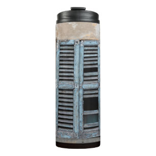 Old ruined wooden window of old houseancier, antiq thermosbeker