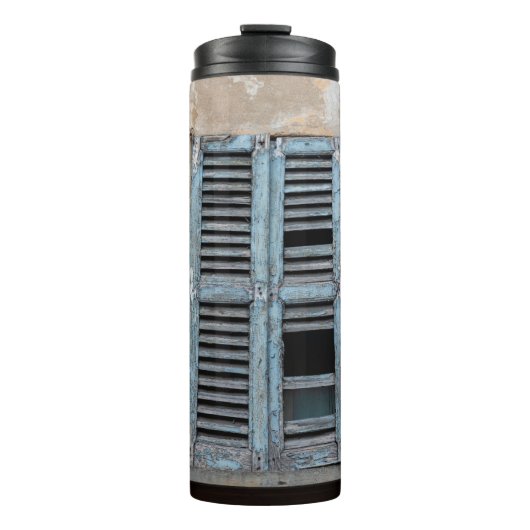 Old ruined wooden window of old houseancier, antiq thermosbeker (Voorkant)