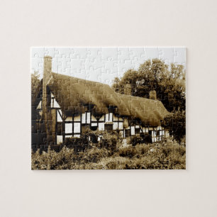 Old thatched Tudor cottage England Legpuzzel