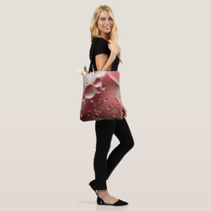 Olie op water tote bag