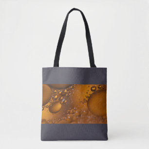 Olie op water tote bag