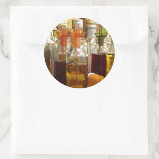  olieflessen ronde sticker (Tas)
