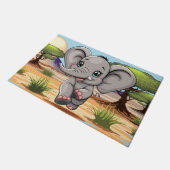 Olifant Baby springt vrolijk in Afrikaanse savanne Deurmat (Schuin)