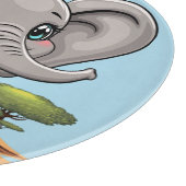 Olifant Baby springt vrolijk in Afrikaanse savanne Snijplank (Hoek)