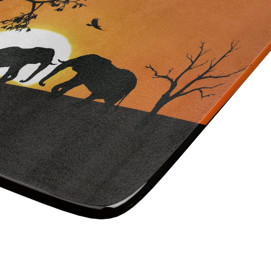 Olifanten bij zonsondergang snijplank (Hoek)