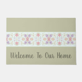 Olijfgroen typografie met pastelbloem deurmat
