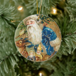 Olijfkerstman met een Rudolph Ceramic O Keramisch Ornament<br><div class="desc">kerst,  kerstmis,  santa claus,  xmas,  grappig,  olijf,  sneeuwman,  santa,  schattig,  kerstboom,  vakantie,  dier,  sneeuw,  cool,  koel,  panda,  beer,  panda-beer,  zoet,  mooi,  band,  en,  band van de rand,  idee,  quarantaine,  drink,  drink,  martini,  alcohol,  quarantaineverminnaar,  liefhebbers,  schattig</div>