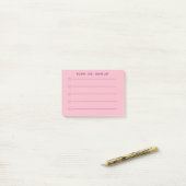 Om dit te doen deden een lijst met kleine, roze se post-it® notes (Op bureau)