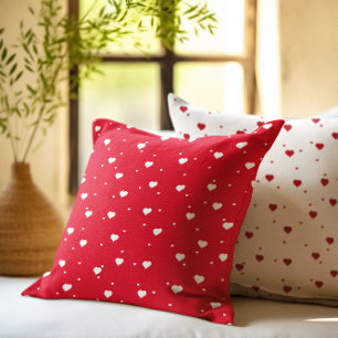 Omkeerbaar patroon van witte en rode harten kussen
