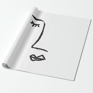 Omtrek van gezicht geschilderd met een borstel van cadeaupapier