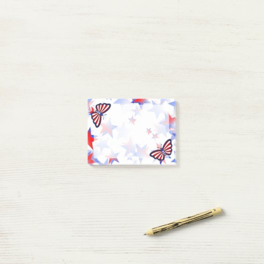 Onafhankelijke rode, witte, blauwe, grafische vlin post-it® notes (Op bureau)