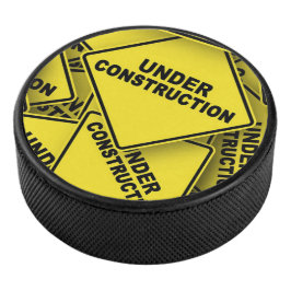 Onder constructietekens hockey puck