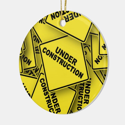 Onder constructietekens keramisch ornament (Links)