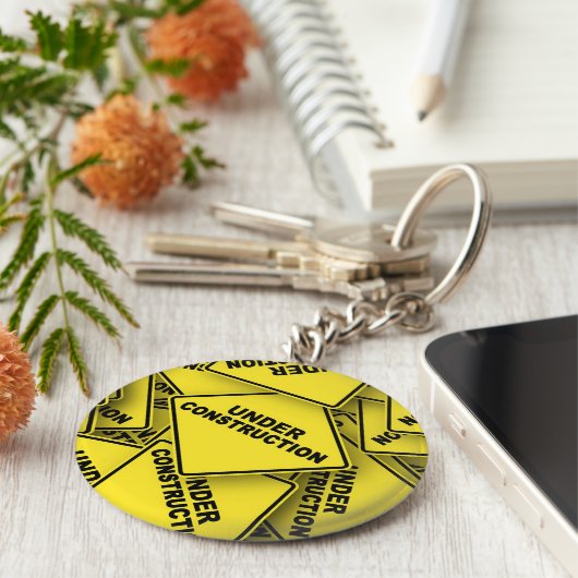 Onder constructietekens sleutelhanger (Zijkant)