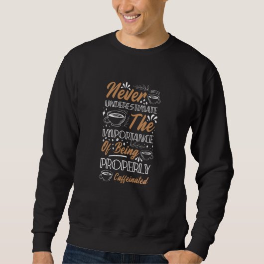 Onderschat koffie nooit | Koffie Design Trui (Voorkant)