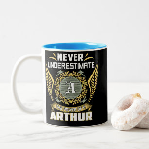 Onderschat nooit de kracht van een Arthur Tweekleurige Koffiemok