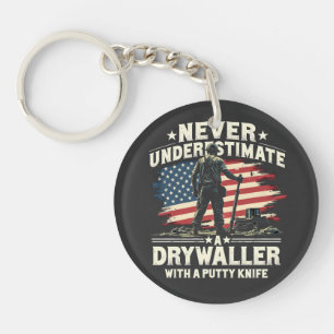 Onderschat nooit een drywaller met een stopmes sleutelhanger