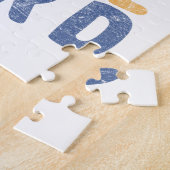 Onderschat nooit een oud Man met een pedelbord Legpuzzel (Zijkant)