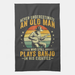 Onderschat nooit een oude man die banjo speelt theedoek