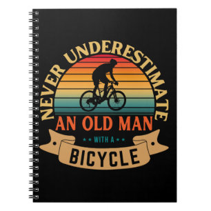 Onderschat nooit een oude man met een fiets notitieboek