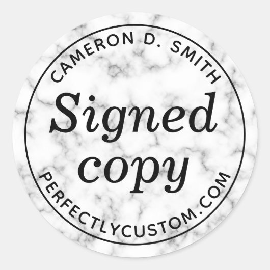 Ondertekend exemplaar witte marmer kijkt auteur na ronde sticker (Voorkant)