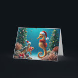Onderwater Kerst Zeepaardje en Zee Schildpad Kaart<br><div class="desc">Onderwater,  een zeepaardje en een zeeen schildpad draag kerstmutsen omringd door een clownvis en koraalriffen versierd met feestelijke ornamenten. Alle tekst kan worden gewijzigd.</div>
