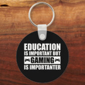 Onderwijs is belangrijk, maar games zijn belangrij sleutelhanger (Voorkant)