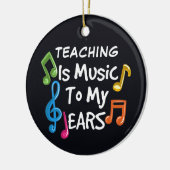 Onderwijzen is muziek naar mijn eigen oorlogen keramisch ornament (Links)