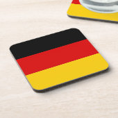 Onderzetter van harde kunststof met Duitse vlag (Linkerzijde)