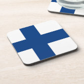 Onderzetter van harde kunststof met Finse vlag (Linkerzijde)