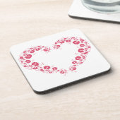 Onderzetter van harde kunststof met hartsymbool (Linkerzijde)