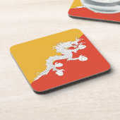 Onderzetter van harde kunststof met vlag van Bhuta (Linkerzijde)