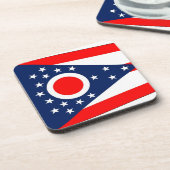 Onderzetter van harde kunststof met vlag van de st (Linkerzijde)