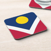 Onderzetter van harde kunststof met vlag van Denve (Linkerzijde)