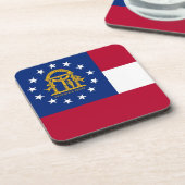 Onderzetter van harde kunststof met vlag van Georg (Linkerzijde)