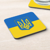 Onderzetter van harde kunststof met vlag van Oekra (Linkerzijde)