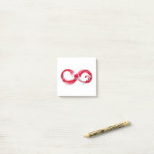 Oneindigheid met rode wijn post-it® notes (Op bureau)
