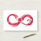 Oneindigheid met rode wijn post-it® notes (Op bureau)