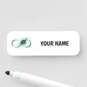 Oneindigheidssymbool met pauwenveer naamplaatje (In situ)