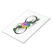 Oneindigheidssymbool met regenboogroos notitieblok (Schuin)