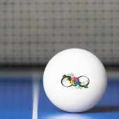 Oneindigheidssymbool met regenboogroos pingpongbal (Net)