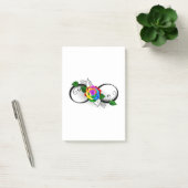 Oneindigheidssymbool met regenboogroos post-it® notes (Kantoor)