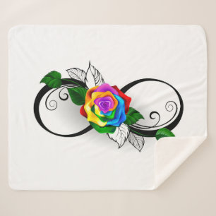 Oneindigheidssymbool met regenboogroos sherpa deken