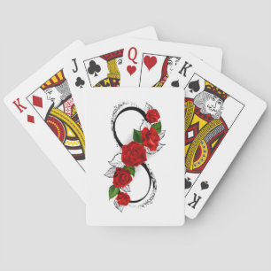 Oneindigheidssymbool met rode rozen pokerkaarten