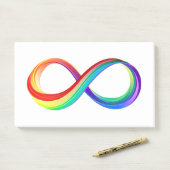 Oneindigheidssymbool van de regenboog in lagen post-it® notes (Op bureau)