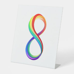 Oneindigheidssymbool van de Regenboog in Lagen Reclamebord Met Voetstuk