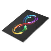 Oneindigheidssymbool van regenboogkometen notitieblok (Schuin)
